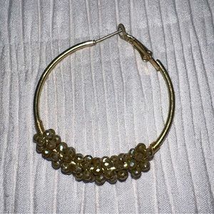 Gold hoop earrings with bling accents
